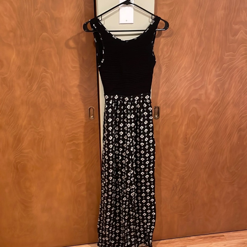 Super cute, open back, jumper.